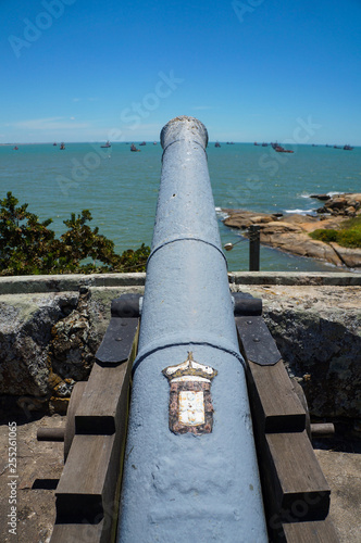 Old cannon pointed out to the sea inside Marechal Hermes Fort, Macaé, Rio de Janeiro, Brazil