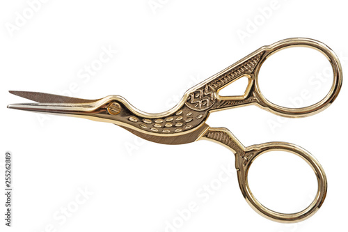 Obraz na płótnie Scissors with curly handles in the shape of a bird, with clipping path, isolated on white background w salonie