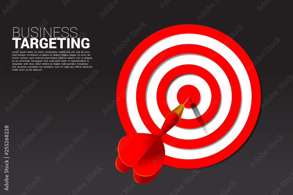 dart arrow hit the center of dartboard . Business Concept of marketing target and customer.Company vision mission and goal. dart arrow hit the center of dartboard . Business Concept of marketing target and customer.Company vision mission and goal.