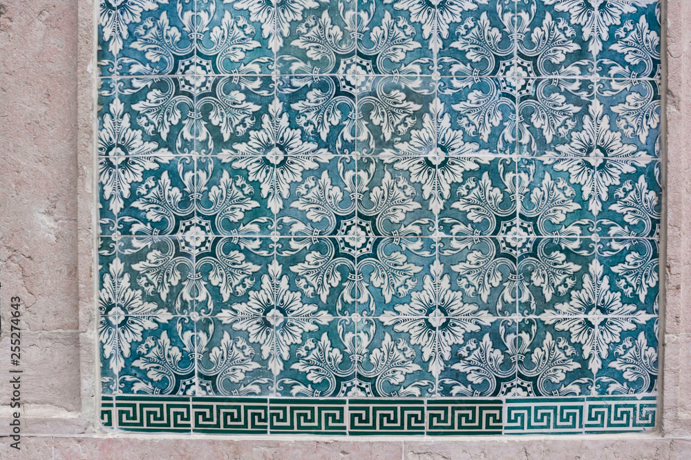 Ornate brightly colored Portuguese tile texture in blue green and white