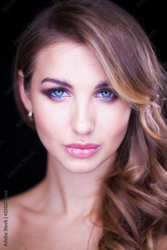 Closeup portrait of beautiful model with long blond hair Closeup portrait of beautiful model with long blond hair