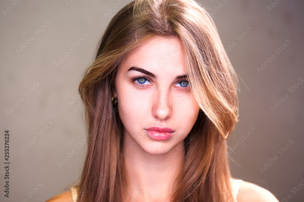 Naklejka premium Portrait of a young beautiful blonde woman