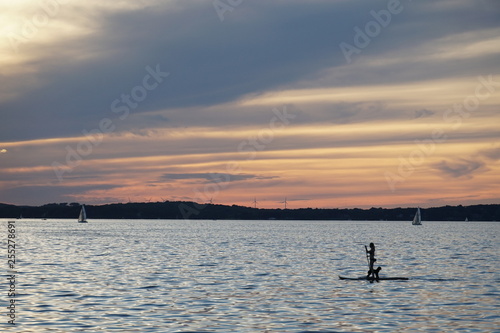Paddle boarding at sunset © Phillip