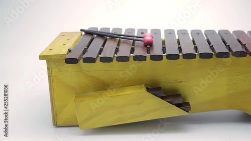 Nice and clear footage side xylophone on the white background with dolly shot. 