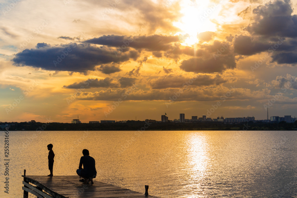 Father and son on the sunset Father and son on the sunset