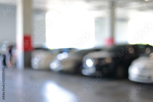car park in business building, blur image © sutichak