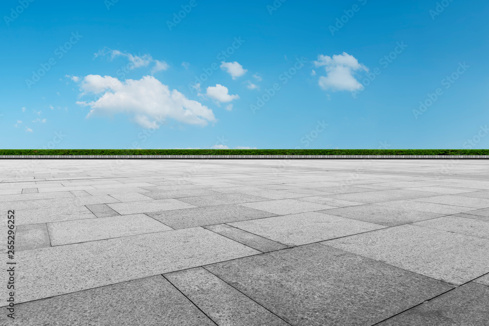 Fototapeta premium Empty square tiles and beautiful sky scenery