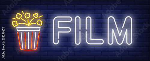 Film neon text with popcorn bucket