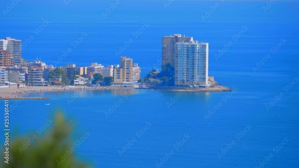 The beaches and coastal hotels of the southern resort town of Spain with tourists and the vast expanses of the Mediterranean sea impress with their views The beaches and coastal hotels of the southern resort town of Spain with tourists and the vast expanses of the Mediterranean sea impress with their views