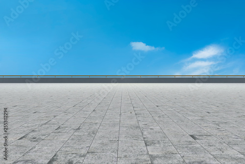 Empty square tiles and beautiful sky scenery