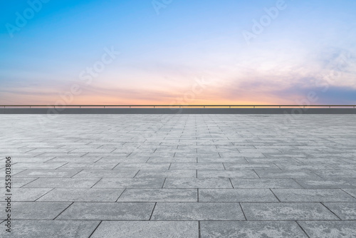 Empty square tiles and beautiful sky scenery © 昊 周