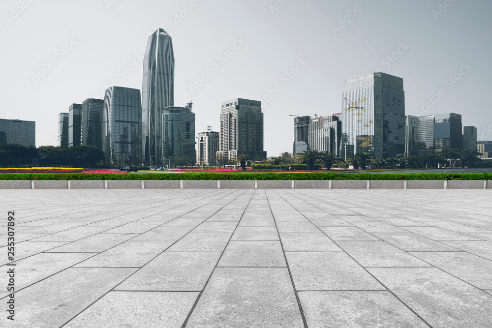 Urban skyscrapers with empty square floor tiles Urban skyscrapers with empty square floor tiles