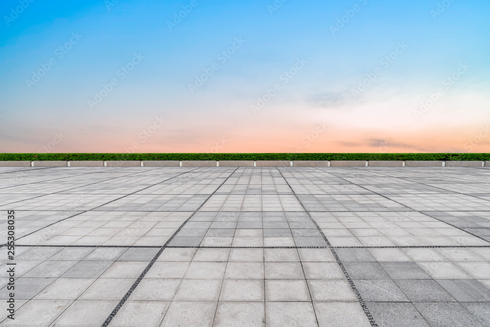 Empty square tiles and beautiful sky scenery Empty square tiles and beautiful sky scenery