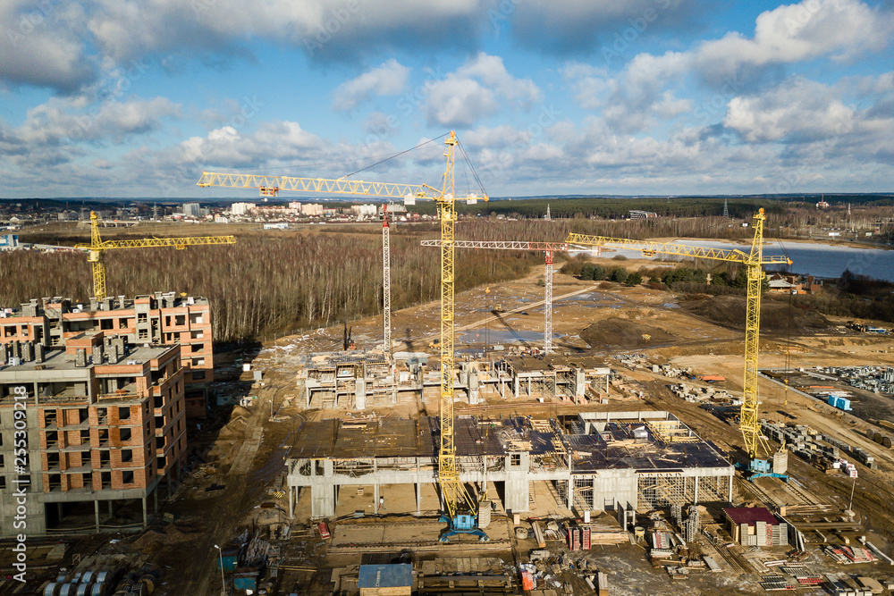 Busy Construction Site and Construction Equipment Aerial Photo