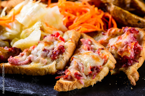 hot sandwiches on a dark background, set of snacks