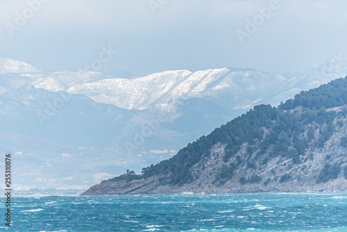 Snow Capped Mountains Along the Southern Italian Coast © JonShore