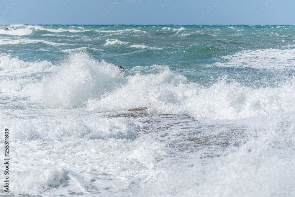 Waves Crashing on Rocks on the Southern Italian Mediterranean Coast