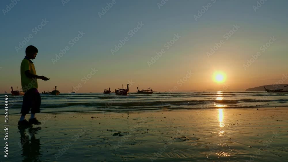 Long tail boat at sunset in Thailand Long tail boat at sunset in Thailand