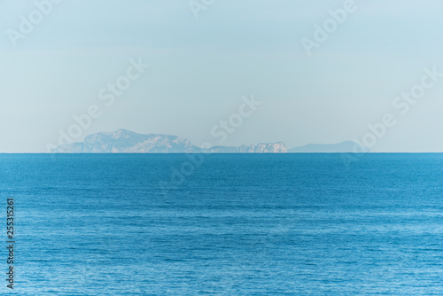 Blue Southern Italian Mediterranean Sea with Island in the Distance
