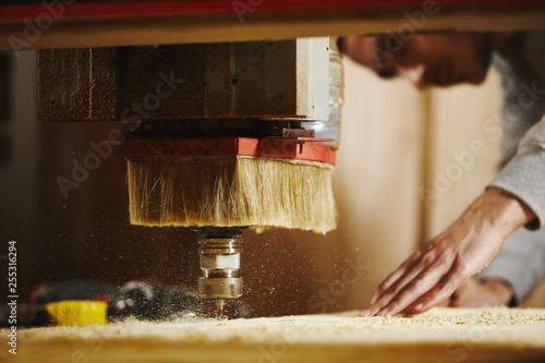 Cutting wood using a machine with numerical control. Cnc tool. photo