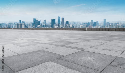 Urban skyscrapers with empty square floor tiles