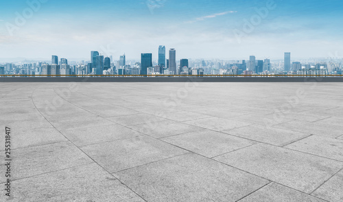 Urban skyscrapers with empty square floor tiles