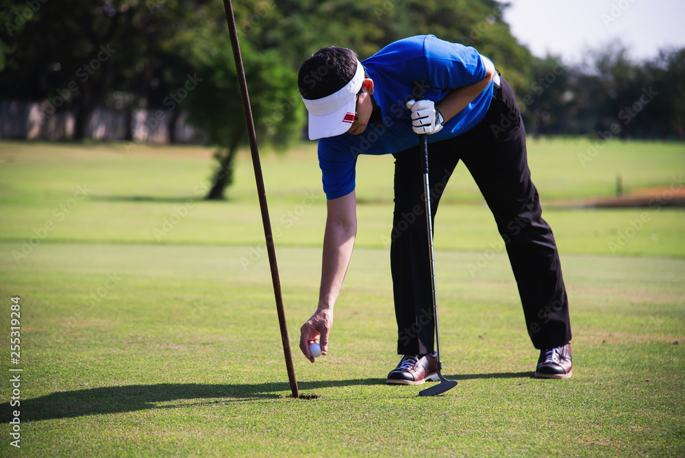 Obraz premium Man play outdoor golf sport activity - people in golf sport concept