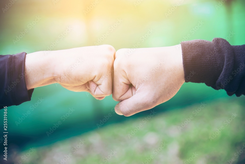 Fototapeta premium Man touching / holding hand together for success commitment work concept