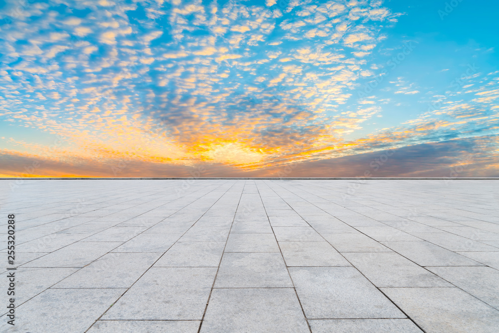 Empty square tiles and beautiful sky scenery Empty square tiles and beautiful sky scenery