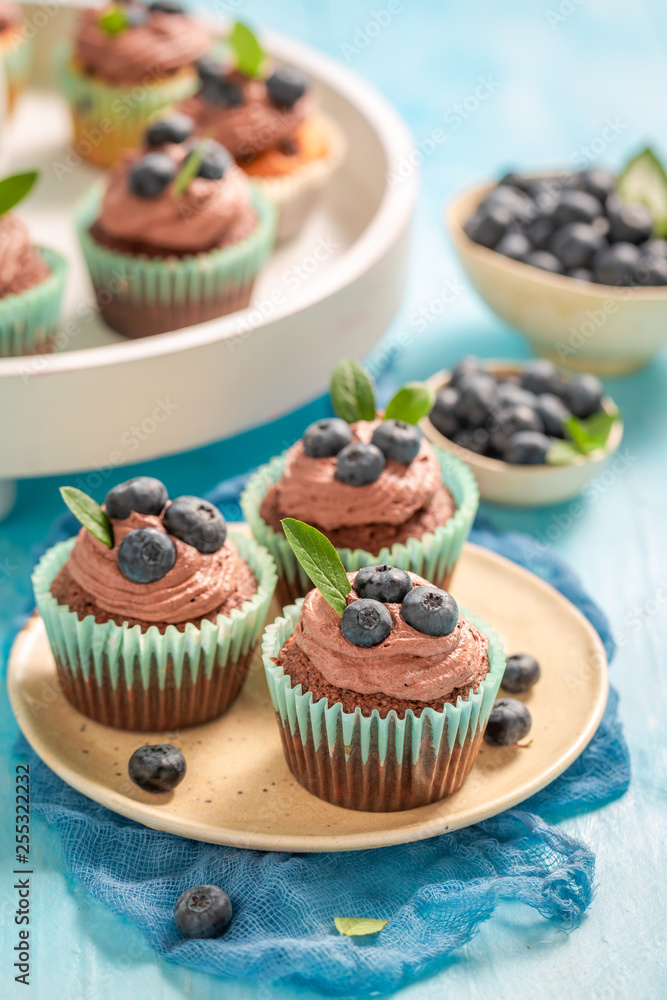 Homemade muffin with blueberries and chocolate cream