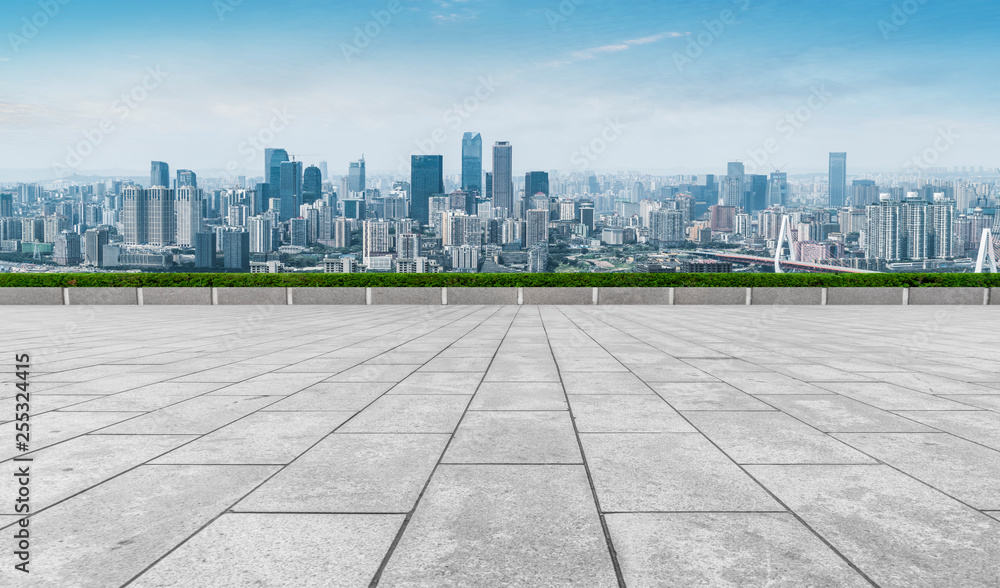 Urban skyscrapers with empty square floor tiles