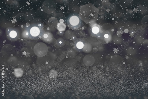 cute brilliant glitter lights defocused bokeh abstract background with falling snow flakes fly, holiday mockup texture with blank space for your content