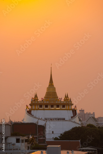 The Golden Mount at Wat Saket at Twilight Time, Travel Landmark of Bangkok, Thailand. © Opman