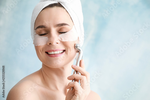 Woman with under-eye patche...