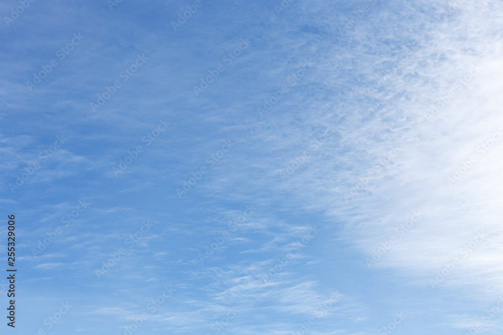 Blue sky with white cirrocumulus clouds. Natural background Blue sky with white cirrocumulus clouds. Natural background
