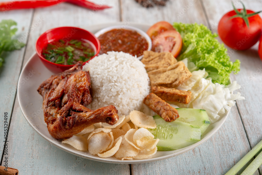 Nasi lemak kukus with fried drumstick Nasi lemak kukus with fried drumstick
