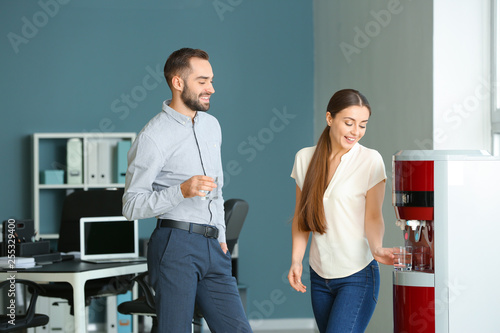 Colleagues drinking water f...