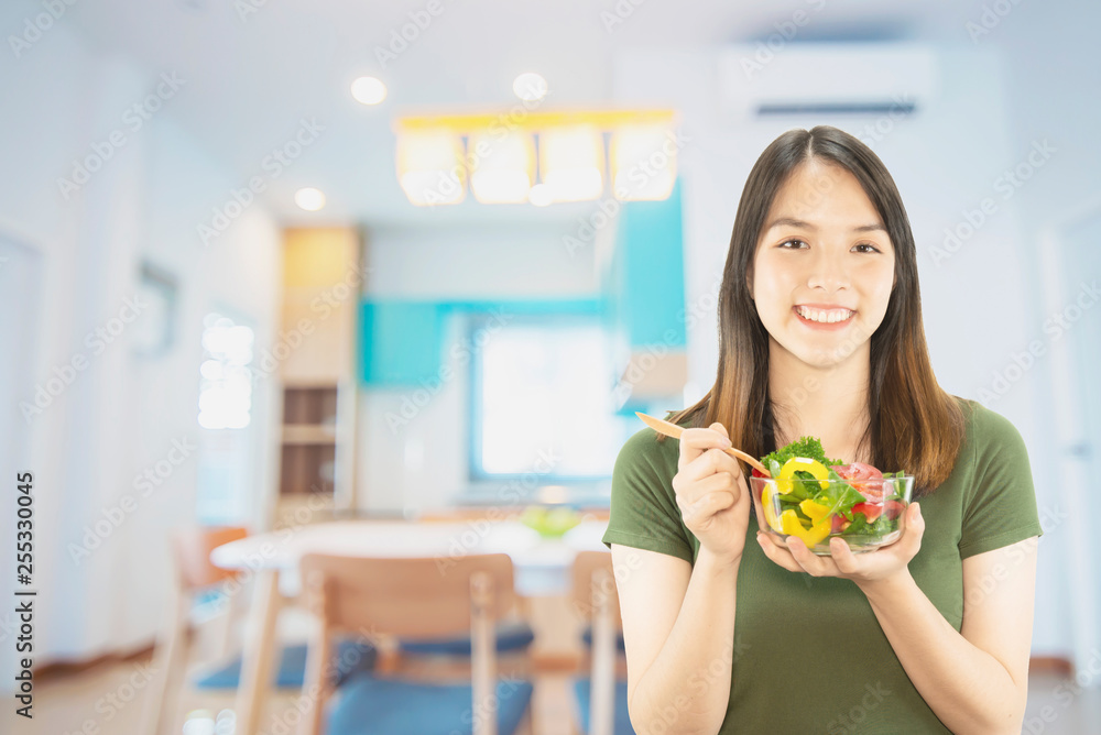 Happy lady holding kichen stuff over copy space background - people home made food preparation concept Happy lady holding kichen stuff over copy space background - people home made food preparation concept