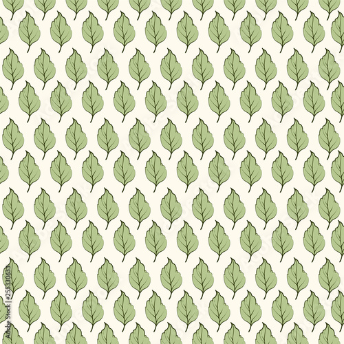 Seamless pattern. Green leaves on light background