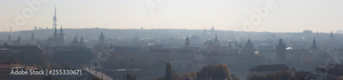 Prague - Panorama of the town from castle in the backlight.