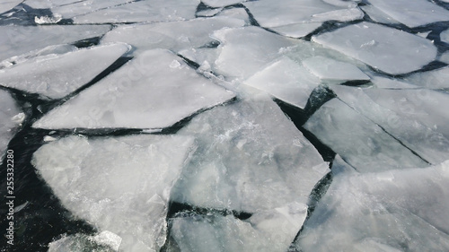 Cracked ice on the surface of the ocean. Global warnimg concept
