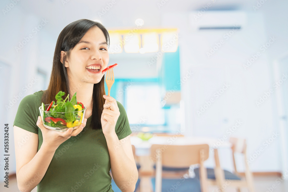 Happy lady holding kichen stuff over copy space background - people home made food preparation concept Happy lady holding kichen stuff over copy space background - people home made food preparation concept