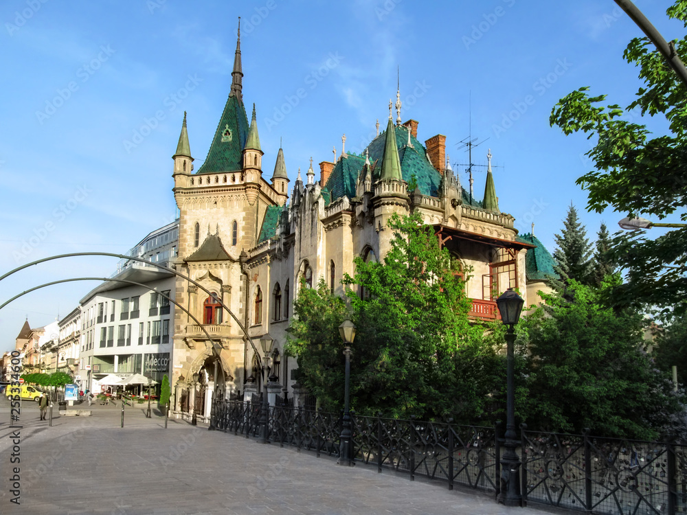 Slovakia, Kosice - May 2, 2018: Jakab's Palace (Jakabov palac) in Kosice - view from the bridge. Beautiful fairy palace with a green roof in a spring sunny day