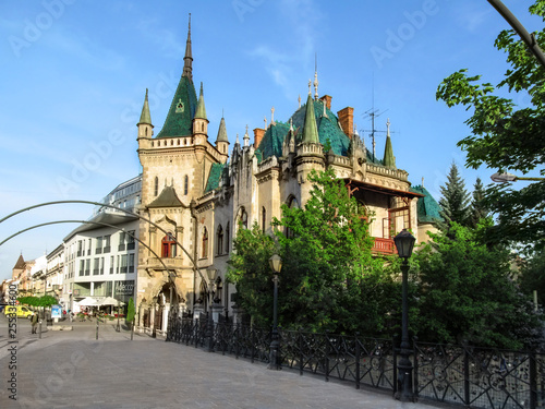 Slovakia, Kosice - May 2, 2018: Jakab's Palace (Jakabov palac) in Kosice - view from the bridge. Beautiful fairy palace with a green roof in a spring sunny day