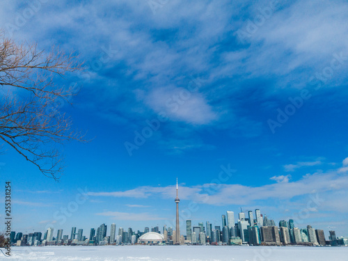 Photography Toronto city skyline seen from toronto Islands over frozen lake Ontario