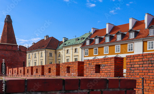 Historic buildings and red brick walls of Warsaw Barbican, Poland