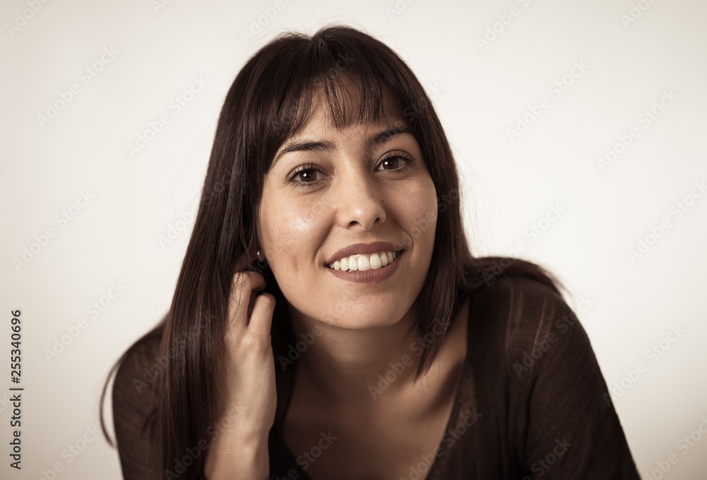 Portrait of young attractive woman with happy and smiling face. Human expressions and emotions Portrait of young attractive woman with happy and smiling face. Human expressions and emotions