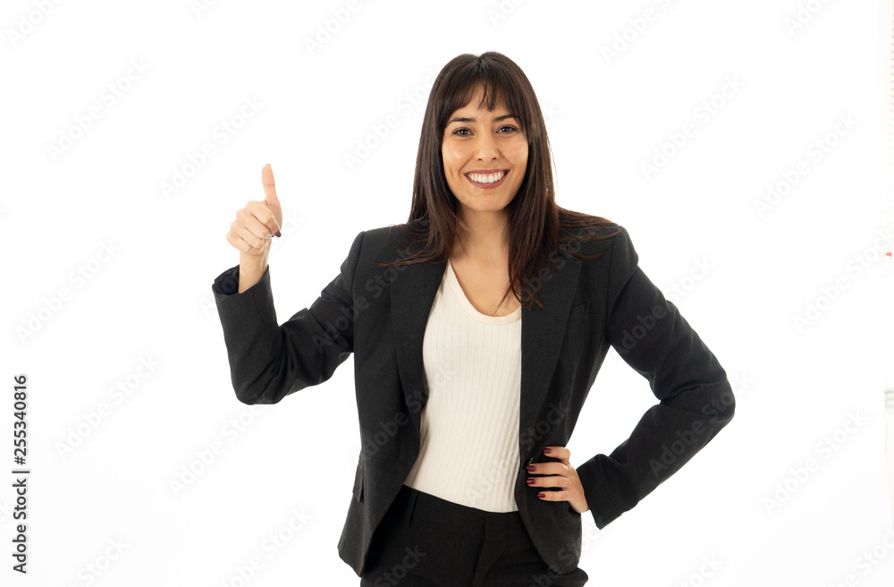 Portrait of a young beautiful smiling business woman showing thumb up. Isolated on white background Portrait of a young beautiful smiling business woman showing thumb up. Isolated on white background