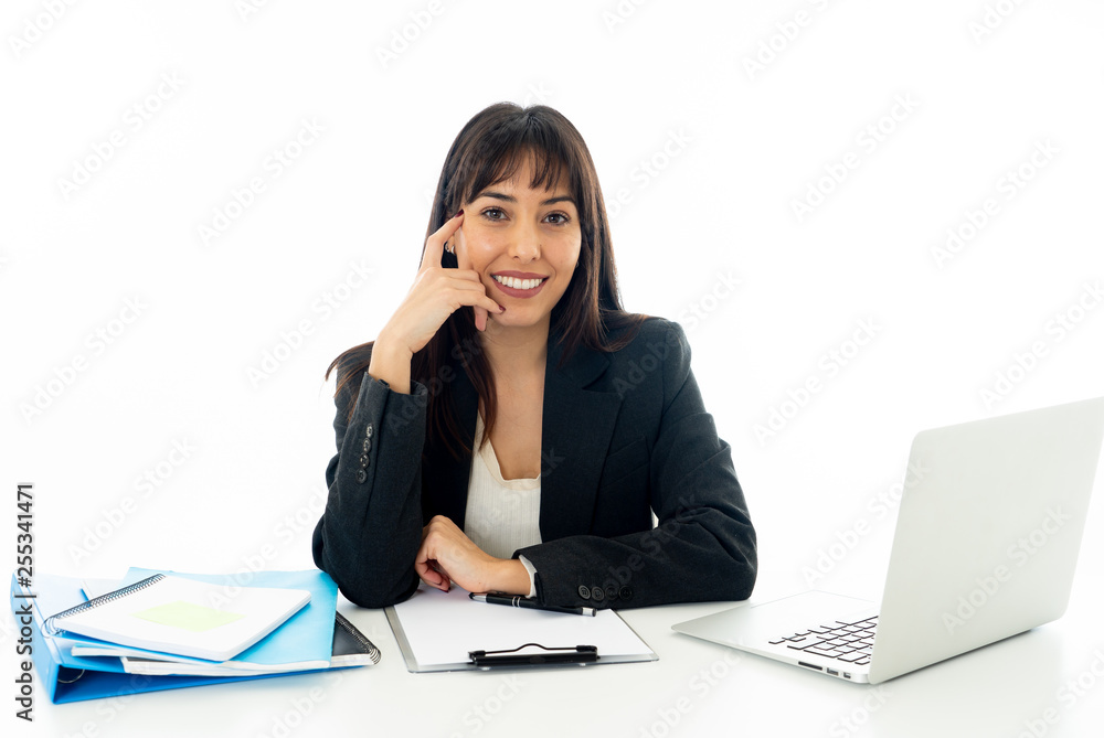 Portrait of a young beautiful business woman happy and confident working on computer at office Portrait of a young beautiful business woman happy and confident working on computer at office