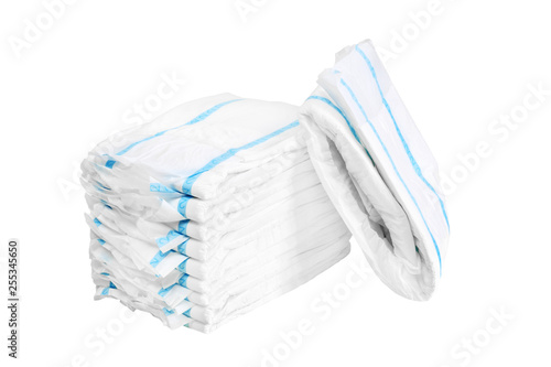 Stack of adult diapers isolated on white background. Health care for people with urinary incontinence